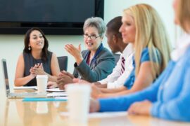 Doctor at conference table